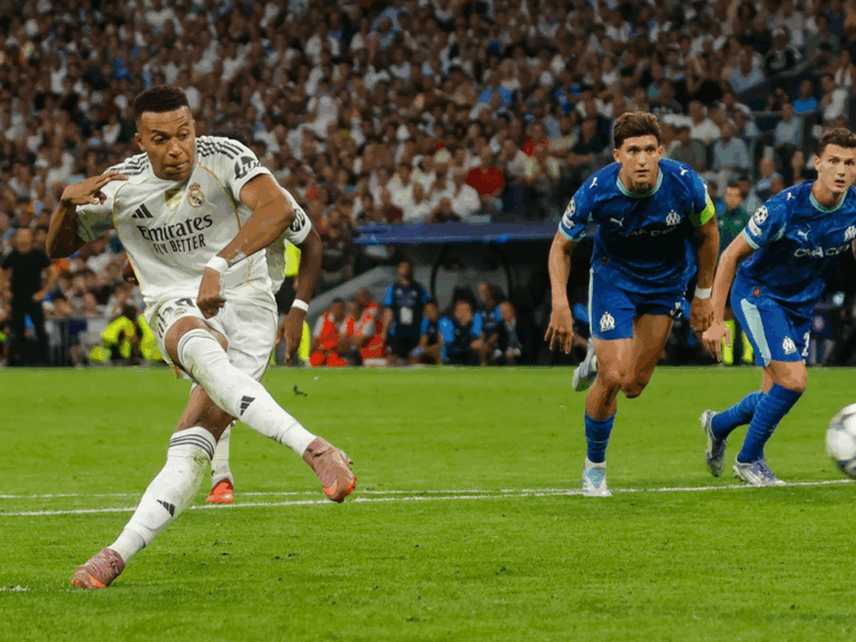 Real Madrid sofre mais do que devia, mas vence Marselha com dois penáltis de Mbappé (2-1)